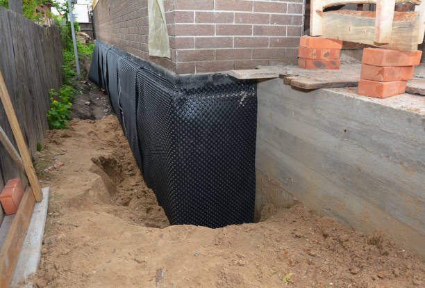 Happy homeowners after waterproofing job in Plantersville